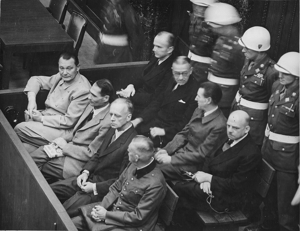Defendants in the dock at the Nuremberg Trials, 1945. Wikimedia Commons.