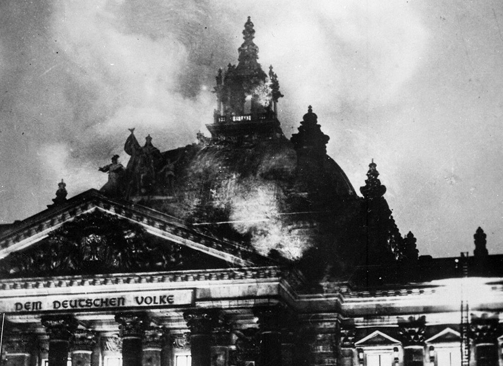 The Reichstag on fire, Berlin, February 1933. Wikimedia Commons.