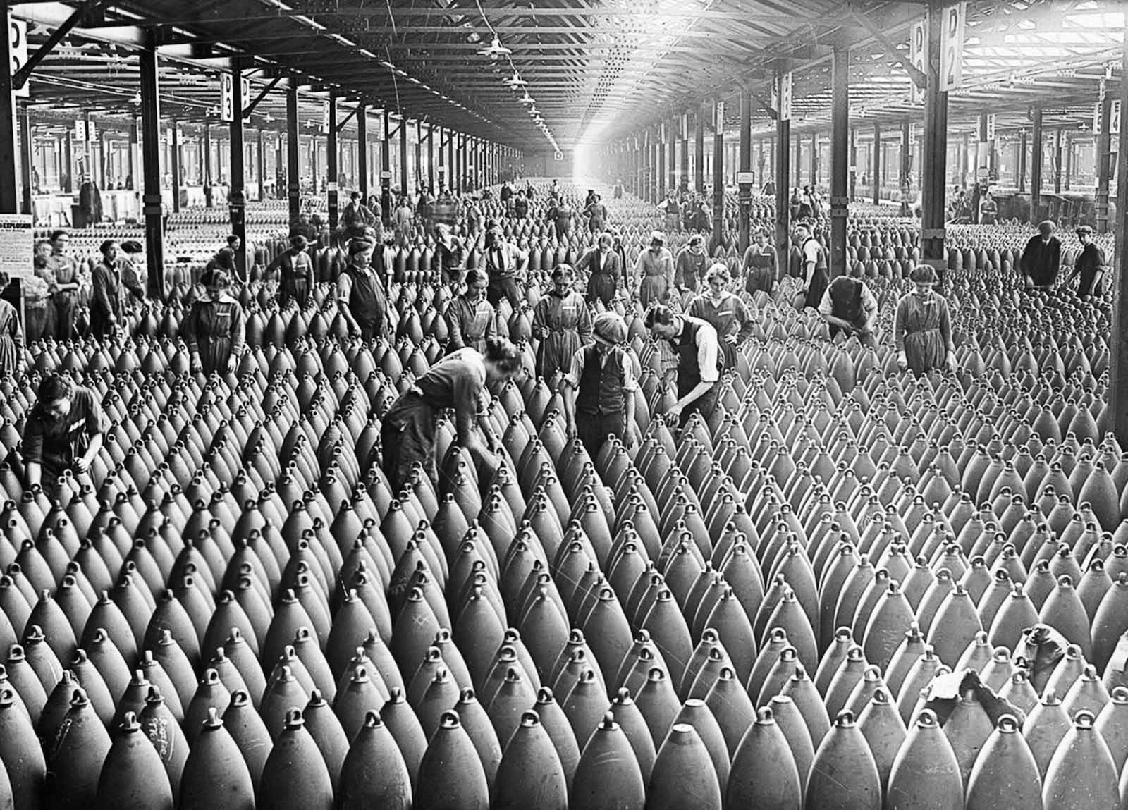 First World War munitions workers amid rows of artillery shells at the National Filling Factory in Chilwell, Nottinghamshire, 1917. CBW/Alamy Stock Photo. First World War munitions workers amid rows of artillery shells at the National Filling Factory in Chilwell, Nottinghamshire, 1917. CBW/Alamy Stock Photo.