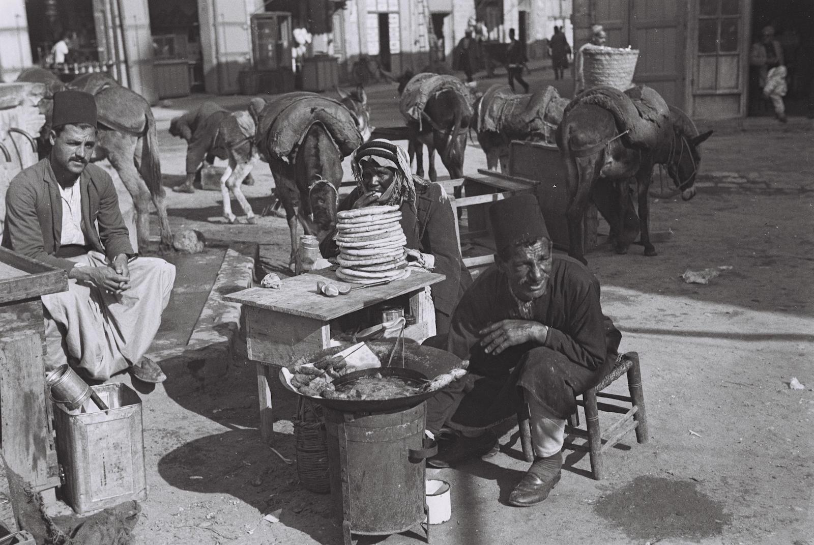 A falafel vender in the Old City of Jerusalem, Palestine, c. 1935. Zoltan Kluger. National Photo Collection of Israel. Public Domain.
