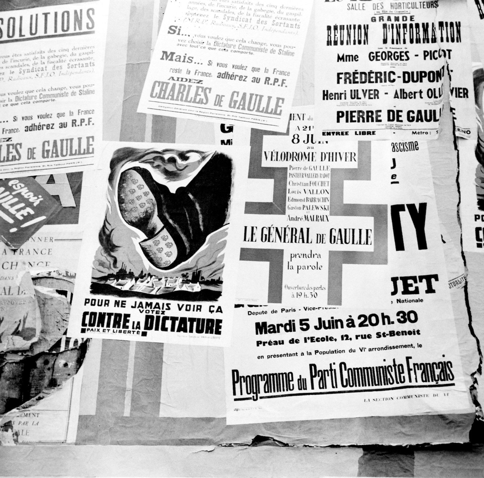 Paris plastered with posters in support of Charles de Gaulle. US National Archives. Public Domain. 