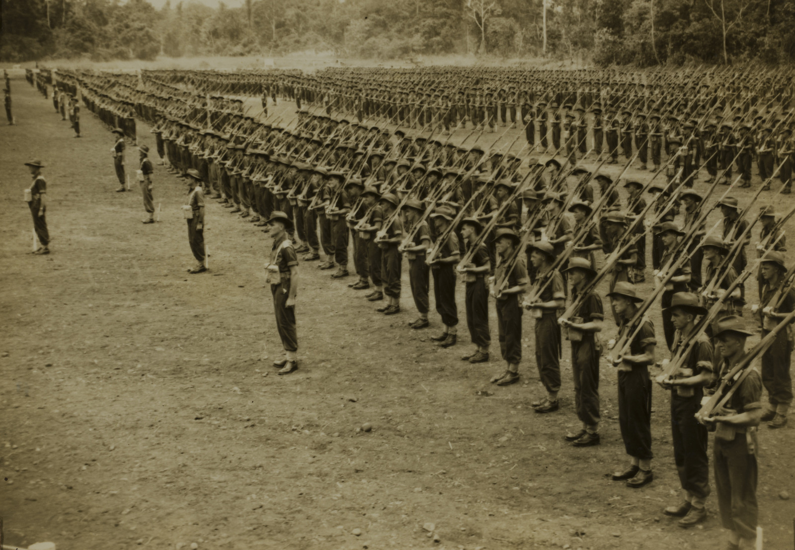 Military parade of Australian soldiers in New Guinea, c. 1943-1944. State Library of Queensland. Public Domain.