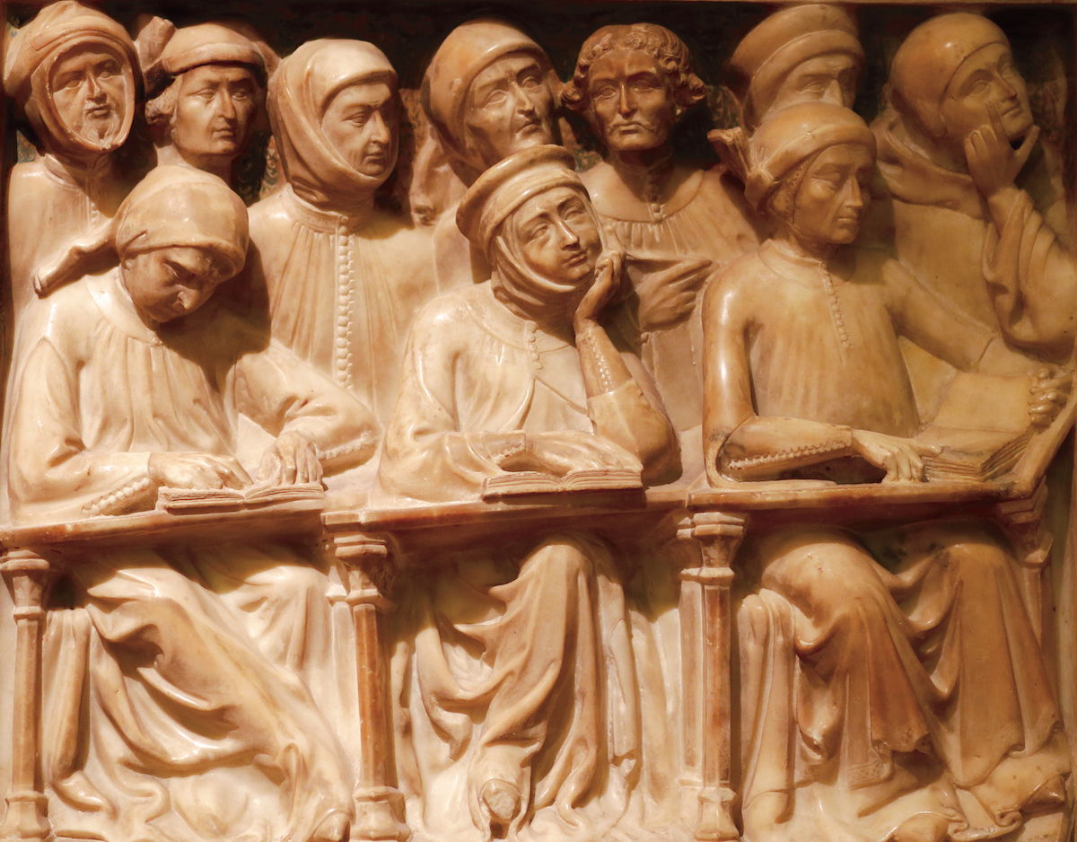 Carving of medieval university students on the tomb of the scholar Giovanni da Legnano, Bologna, 14th century. Sailko (CC BY 2.5).