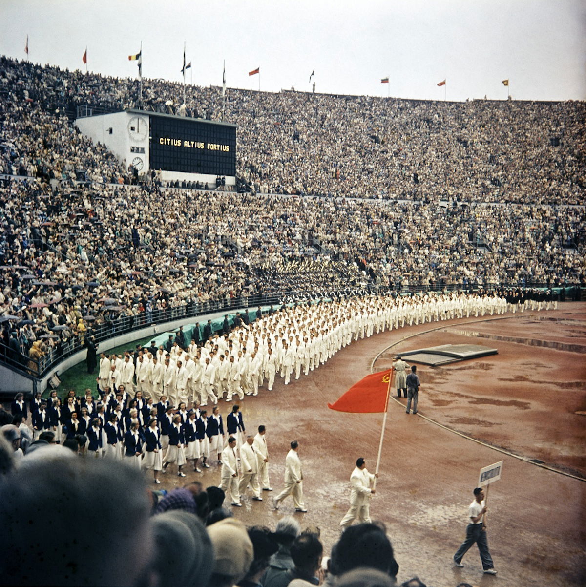The Soviet Olympic team marches into the stadium at the opening of the 1952 Helsinki Olympics, the first one contested by the USSR. Helsinki City Museum (CC0). The Soviet Olympic team marches into the stadium at the opening of the 1952 Helsinki Olympics, the first one contested by the USSR. Helsinki City Museum (CC0).