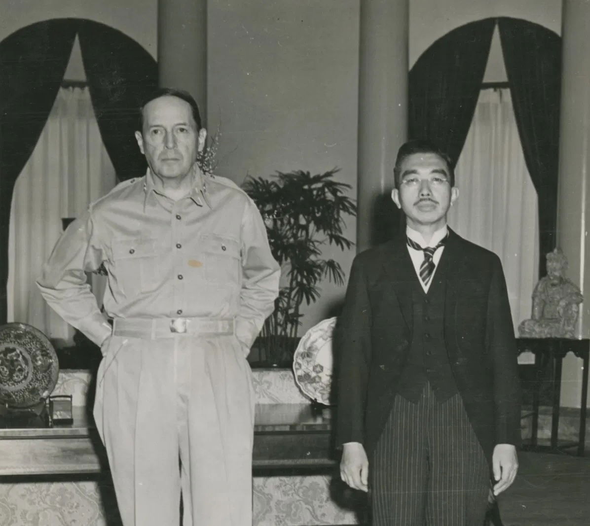 General Douglas MacArthur and Emperor Hirohito at the US embassy in Tokyo, 27 September 1945. NARA. Public Domain.