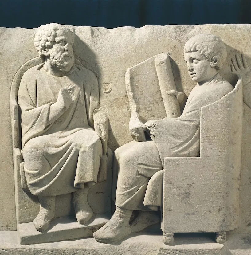 Relief from a burial monument showing a teacher and students, Neumagen, Germany, c.AD 180. G. Dagli Orti/NPL - DeA Picture Library/Bridgeman Images.