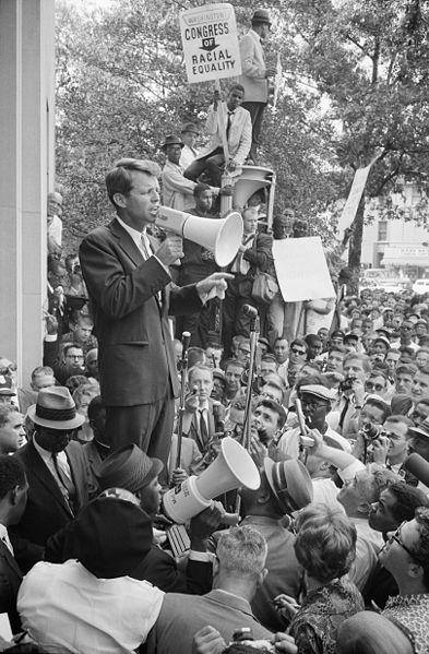 Robert F. Kennedy speaking to a crowd of African Americans and whites outside the Justice Department on June 14th 1963
