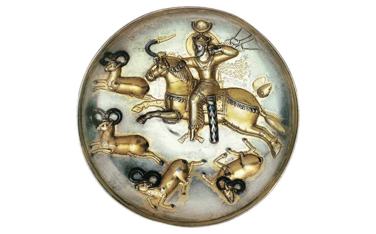 A silver plate depicting the Sasanid King Peroz I on a hunting expedition. Bridgeman Images.