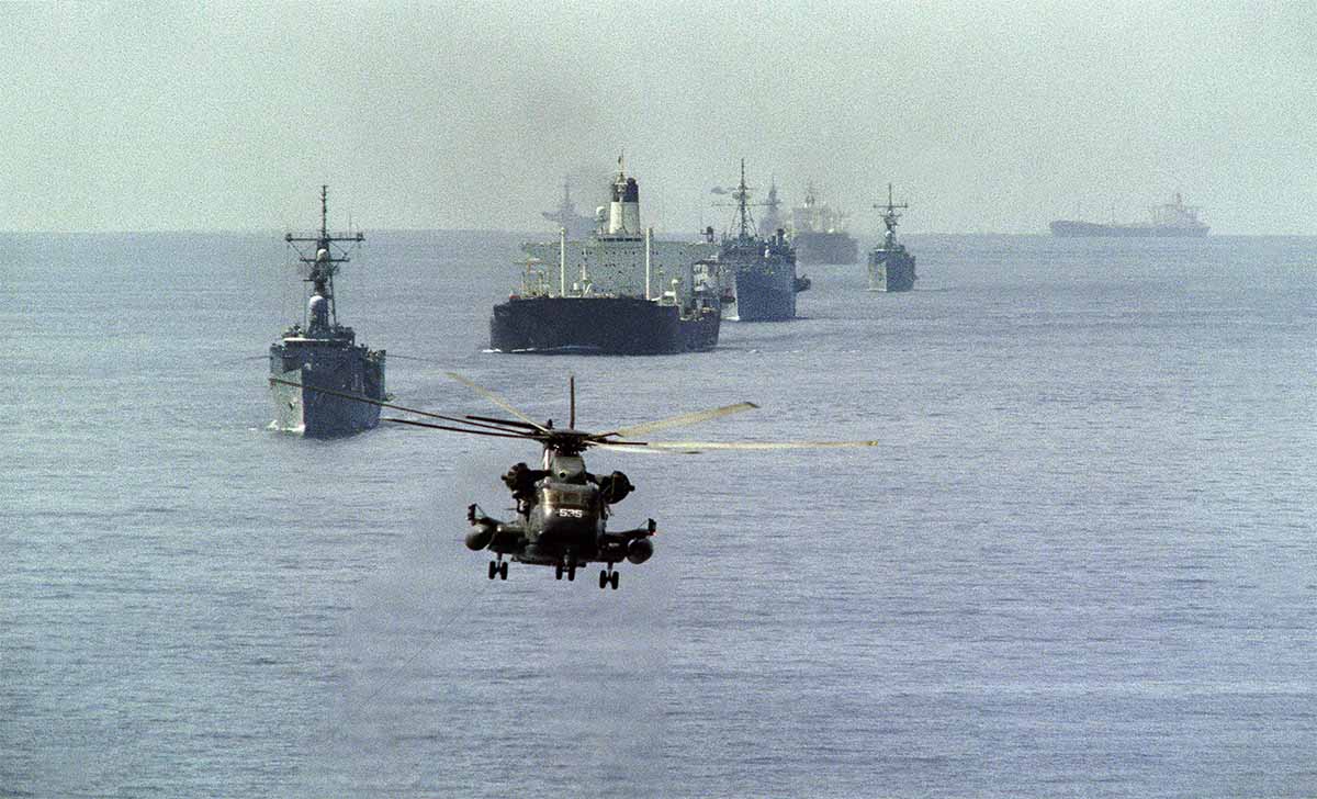 A US navy helicopter minesweeping ahead of a Kuwaiti tanker convoy, Strait of Hormuz, 22 October 1987 © Norbert Schiller/AFP/Getty Images