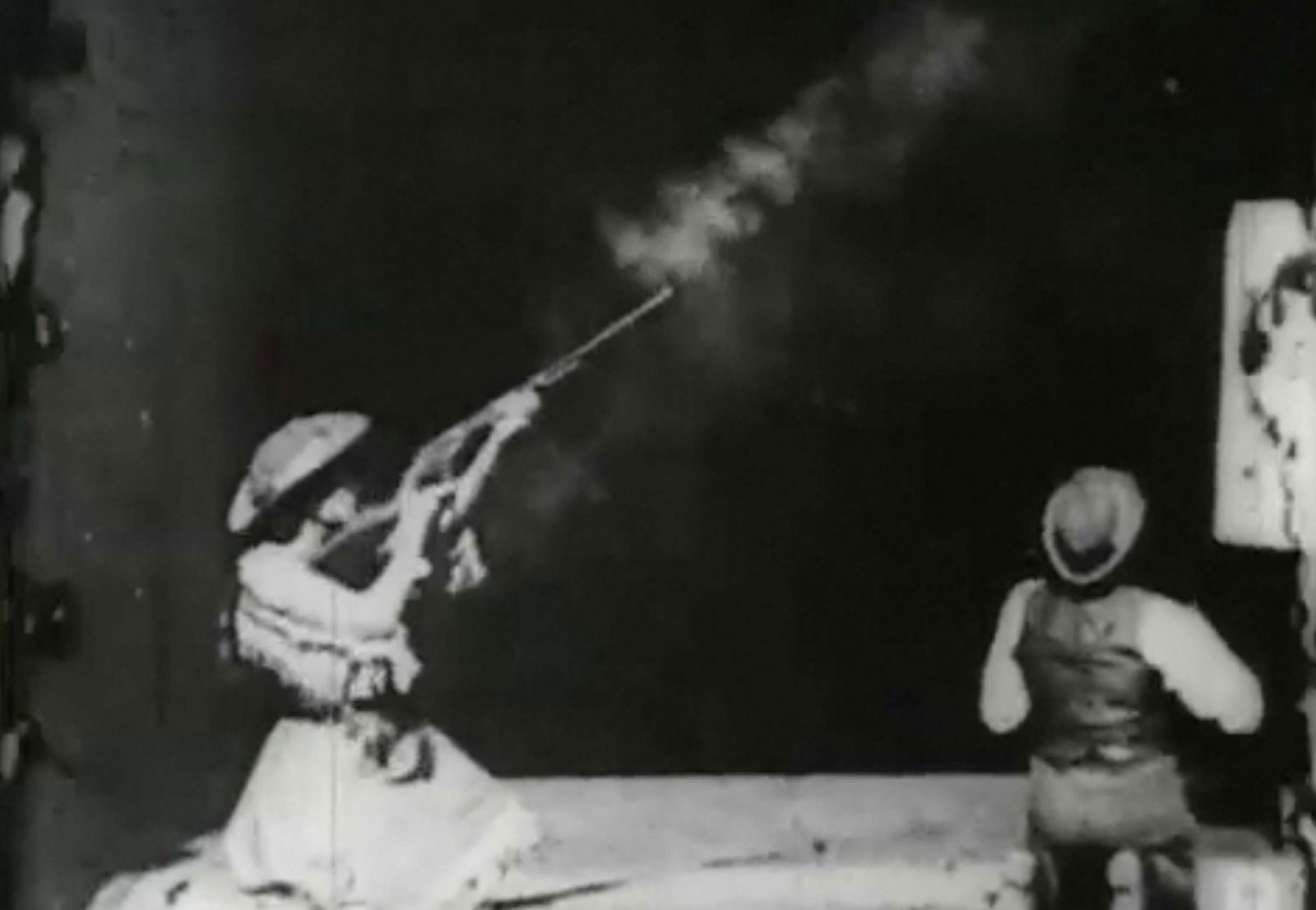 Still from a film of Annie Oakley in an exhibition of rifle shooting. 1895. Library of Congress.