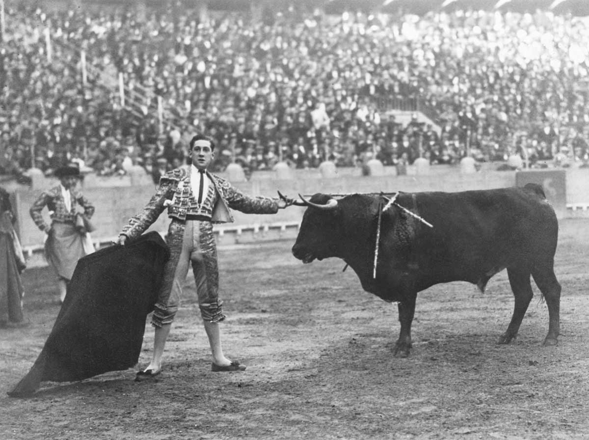 Matador Manuel Granero with the bull, Pocapena, in Madrid, 7 May 1922. Granero would die as a result of being gored during this fight. Photograph by Ernest Hemingway © Ullstein Bild/Getty Images.