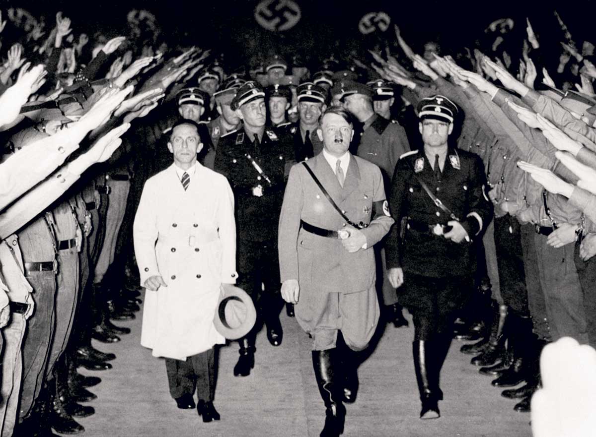 Adolf Hitler and Joseph Goebbels  at a campaign  rally, Berlin Sports Palast, 31 November 1933 © Bettmann/Getty Images.