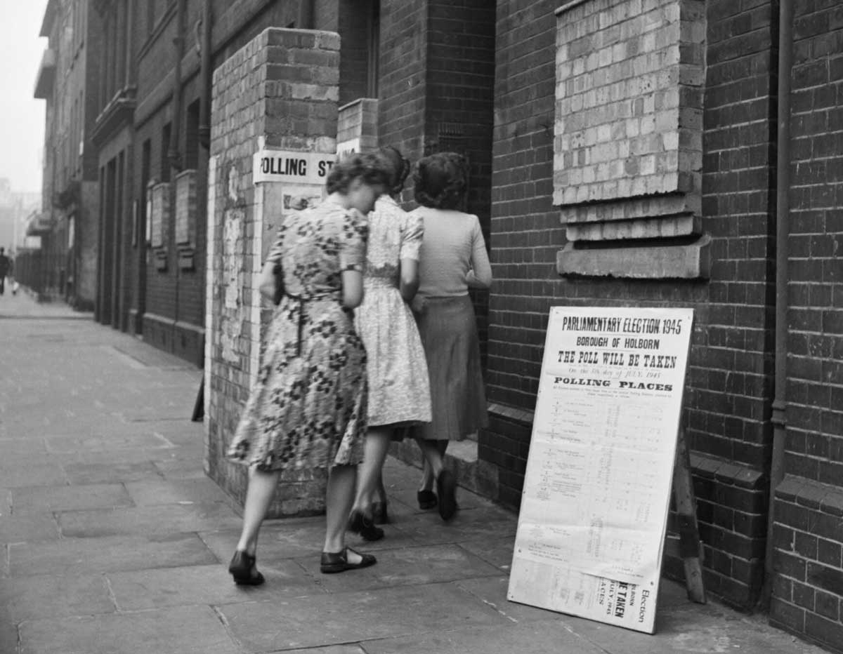 Voters arriving at a polling station in Holborn, London to cast their vote in the General Election of 1945. Wiki Commons.