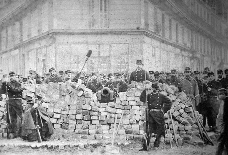  A barricade on Rue Voltaire, after its capture by the regular army during the Bloody Week