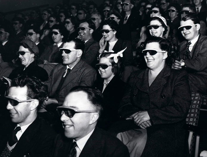 Audience wearing special glasses watch a 3D ‘stereoscopic film’ at the Telekinema on the South Bank in London during the Festival of Britain.