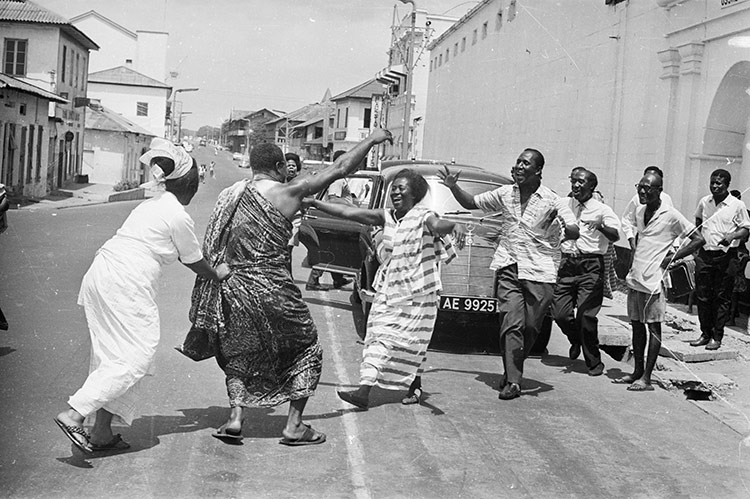 Friends and relations of a political prisoner just released from jail in Ghana greet him joyfully, February 1966. Harry Dempster/Express/Getty Images