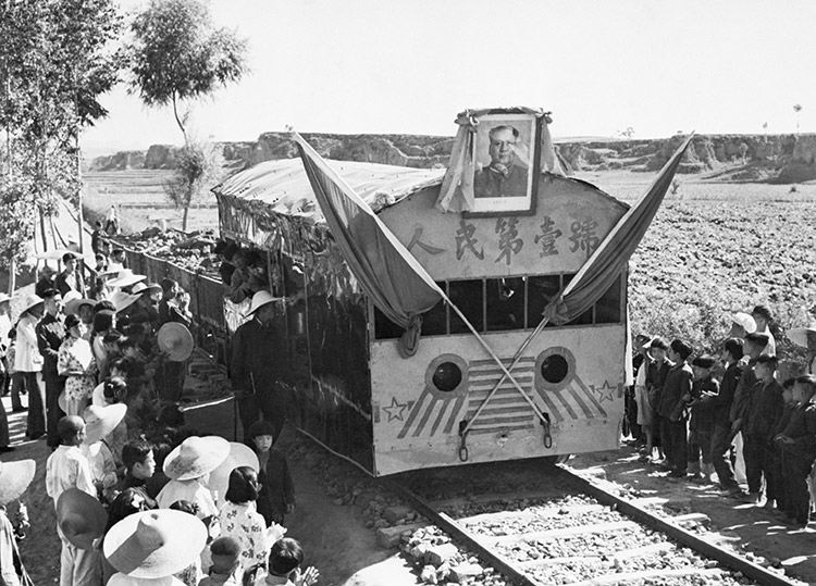 Blood on the tracks: a portrait of Mao adorns a freight train in Yuhsien County, Shansi Province, May 5th, 1958.