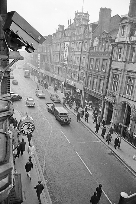Once a rare sight, a CCTV camera overlooks a street in Croydon, 1968. William Lovelace / Getty Images.