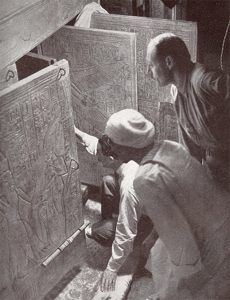 Howard Carter and associates opening the shrine doors in the burial chamber (1924 reconstruction of the 1923 event)