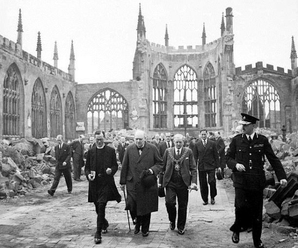 Winston Churchill visiting the ruins of Coventry Cathedral following its destruction in the Coventry Blitz of 14/15th November 1940.