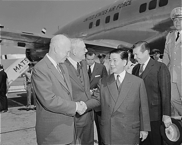U.S. President Dwight D. Eisenhower and Secretary of State John Foster Dulles greet President Ngo Dinh Diem of South Vietnam in Washington, May 8, 1957.