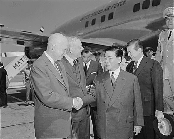 U.S. President Dwight D. Eisenhower and Secretary of State John Foster Dulles greet President Ngo Dinh Diem of South Vietnam in Washington, May 8, 1957.