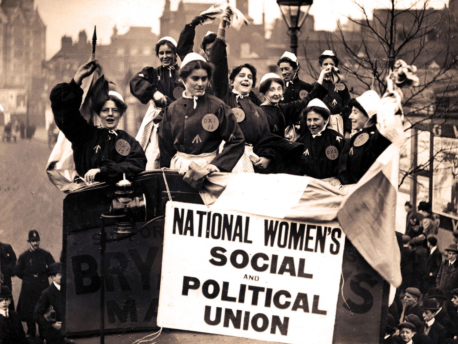 Suffragettes in prison uniform head to a demonstration in Chelmsford, Essex during a parliamentary by-election in 1908. 