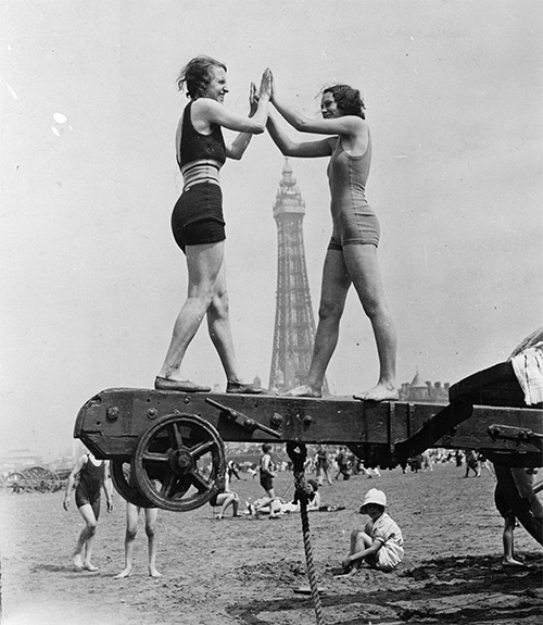 Holidaymakers enjoy a heatwave on Blackpool beach, 1934.