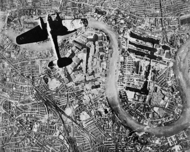 A German Luftwaffe Heinkel He 111 bomber flying over east London, 7 September, 1940