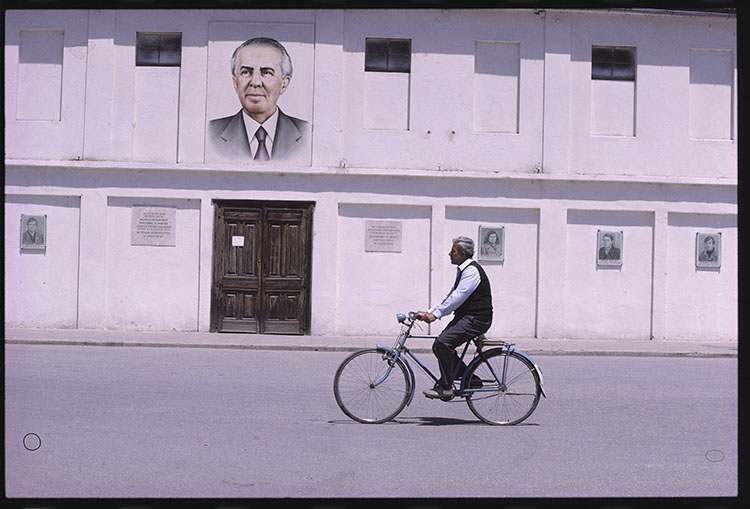 Enver Hoxha portrait on a building.