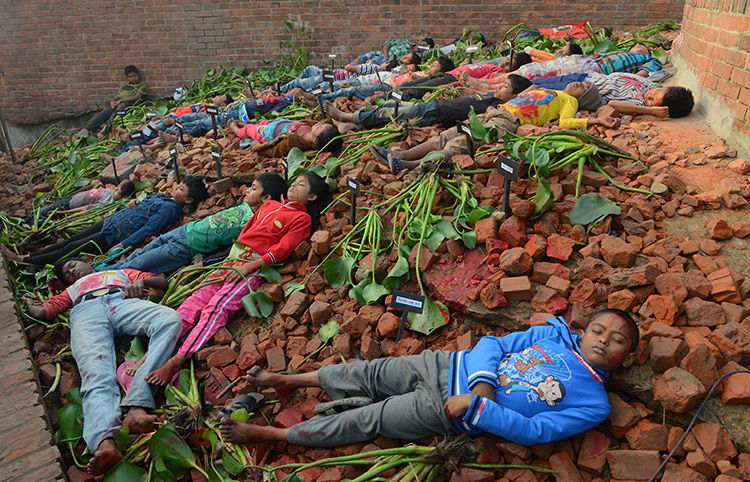 Children re-enact the death of intellectuals during the Liberation War, Dhaka, December 14th, 2013