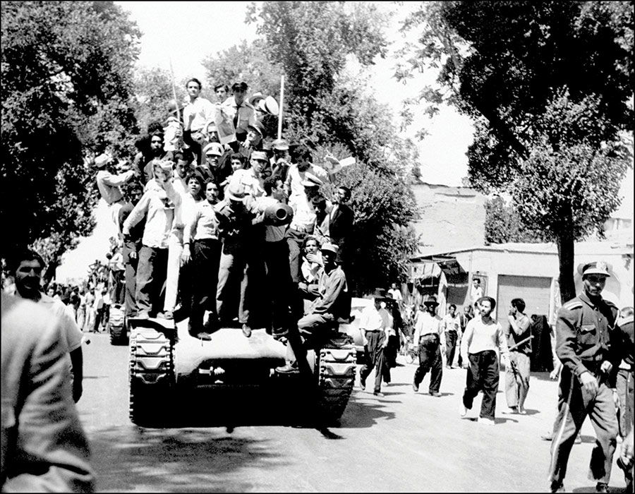 Given the boot: monarchists and the Iranian army celebrate in Tehran, 27 August 1953.