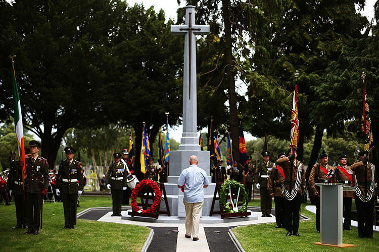 United by conflict: members of the Irish Defence Force (left) and the British Army at Glasnevin Cemetery, Dublin, July 2014