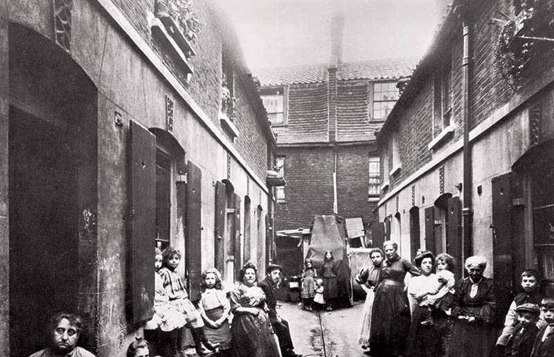 Slum in Victorian London, 19th century. (Bridgeman Images)