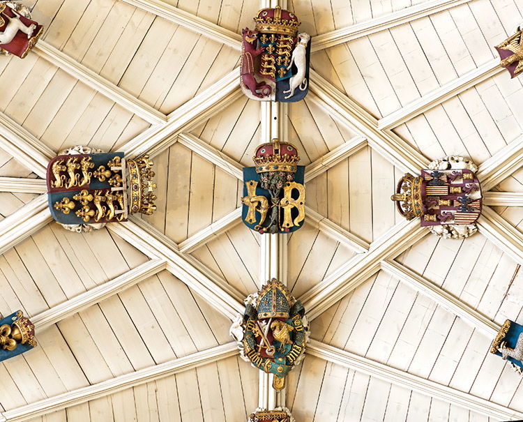 Big boss: the arms of Henry, Prince of Wales and Catherine of Aragon flank the initials of Henricus Rex (Henry VII).