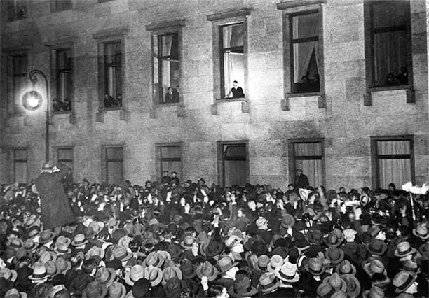 Hitler, at the window of the Reich Chancellery, receives an ovation on the evening of his inauguration as chancellor, 30 January 1933