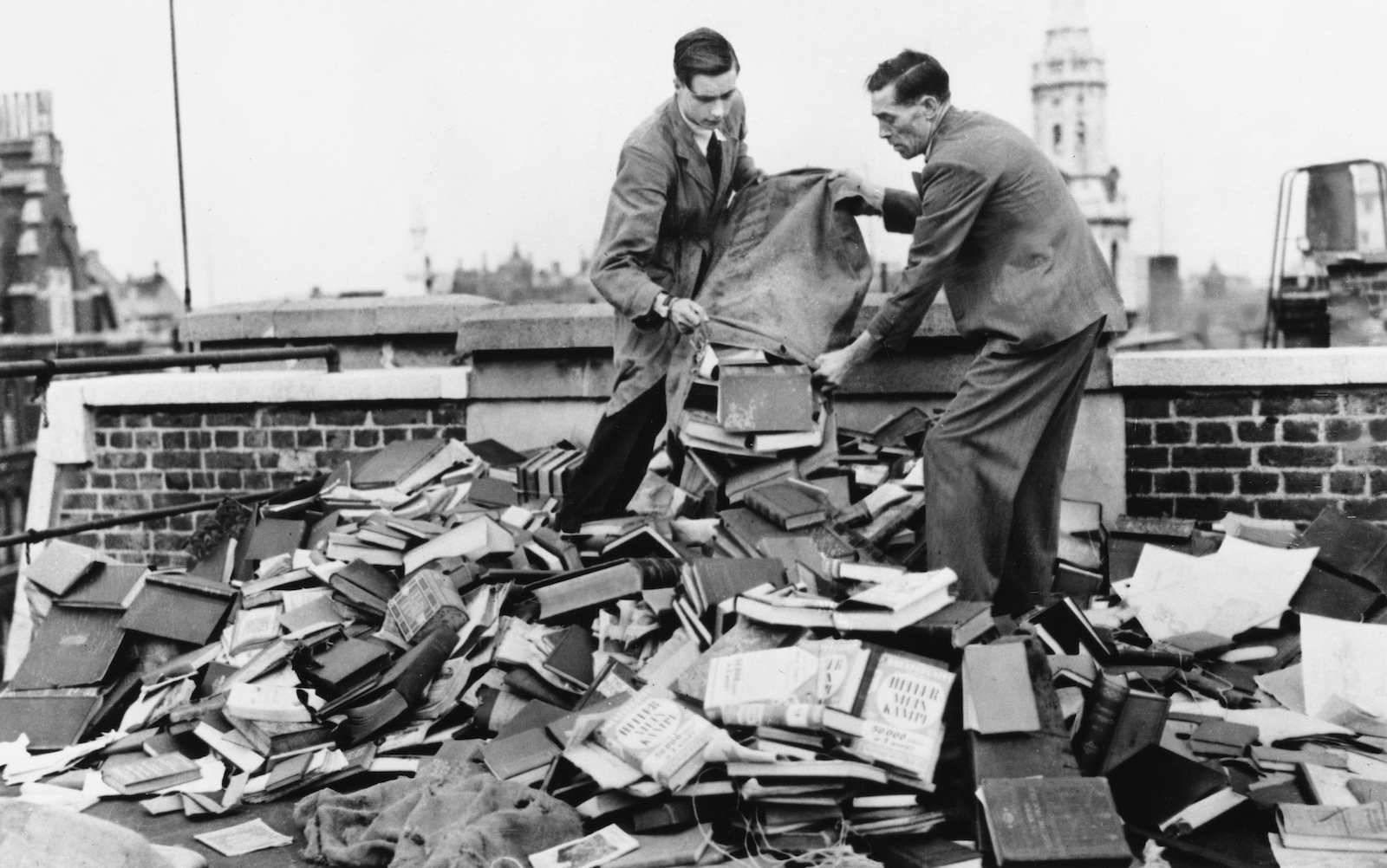 Foyles employees use copies of Adolf Hitler’s Mein Kampf to protect their room from possible German bombs, London, 5 September 1939.