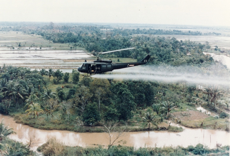 US helicopter spraying Agent Orange during the Vietnam War. Vietnam Center and Sam Johnson Vietnam Archive, Texas Tech University.
