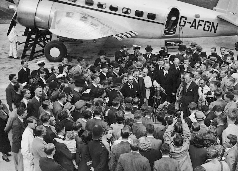 Chamberlain announces the Munich Agreement to the British press.