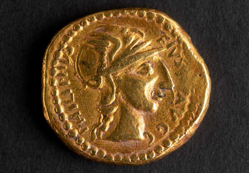 The obverse of a Philip I/II imperial gold coin, depicting the bust of Roma wearing a winged helmet, c.260-70.
