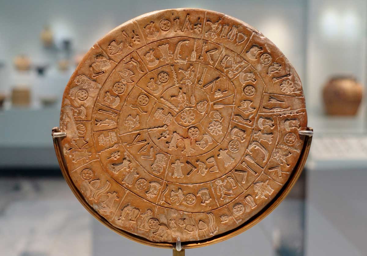 English: The Phaistos Disk (side A) found in the Phaistos archaeological site on July 3, 1908, exhibited in the Heraklion Archaeological Museum, Crete, Greece