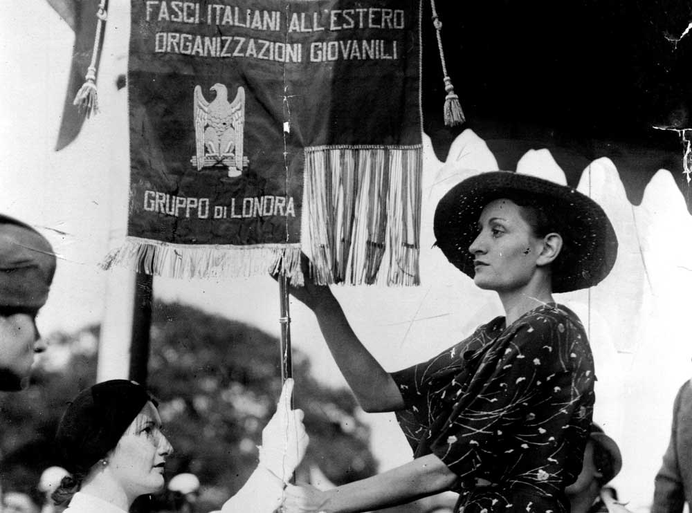 Edda Mussolini presenting a banner at the Banco Commerciale Italiana ground at Edgware, 17 June 1934. Alamy.