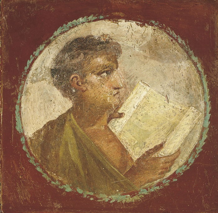Portrait of a young man holding a papyrus scroll, AD 55-79. 
