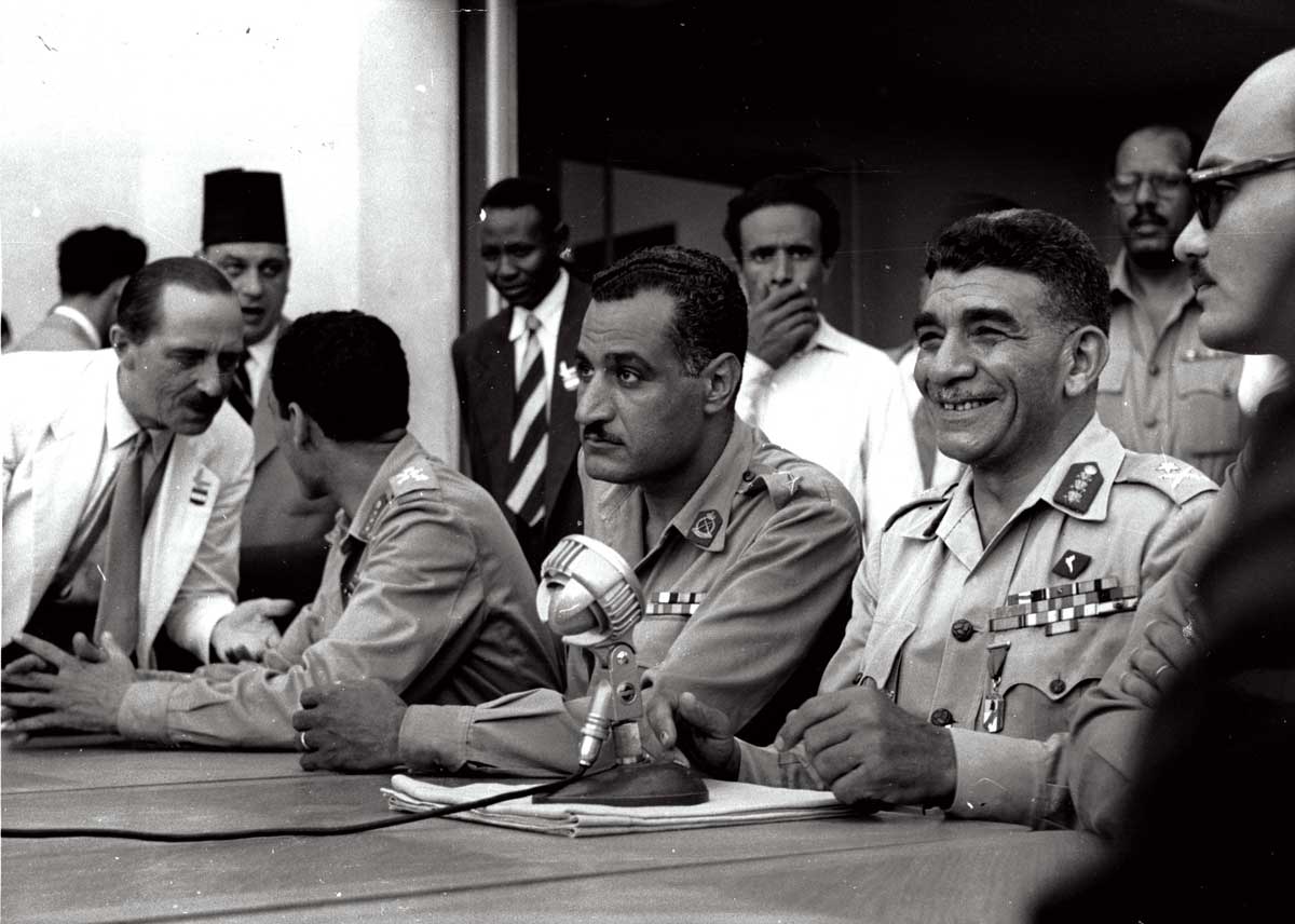 Colonel Nasser (left) and General Naguib at a press conference, 1953.