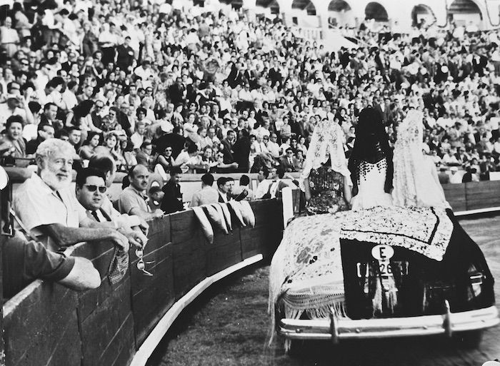 Ernest Hemingway in the crowd at a bullfight 12 August 1960. Nationaal Archief. Public Domain.