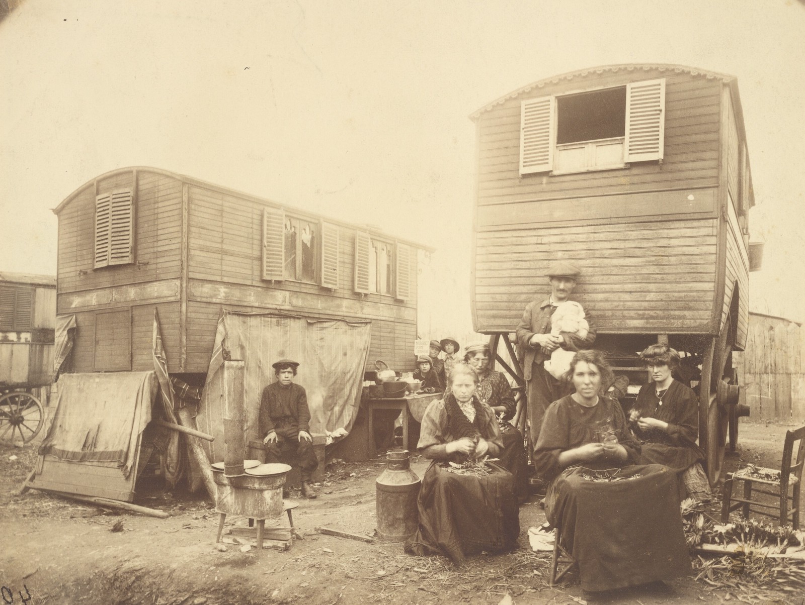 A Roma camp on the outskirts of paris by photographer Eugène Atget, c. 1913