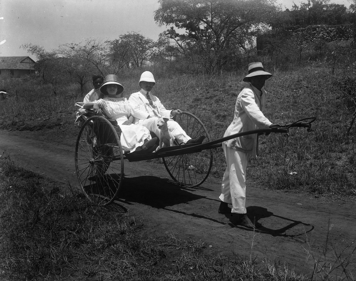 A French couple on a rickshaw in Madgascar, taken by the Swedish photographer Walter Kaudern, c. October 1912. The Museum of World Culture. Public Domain.