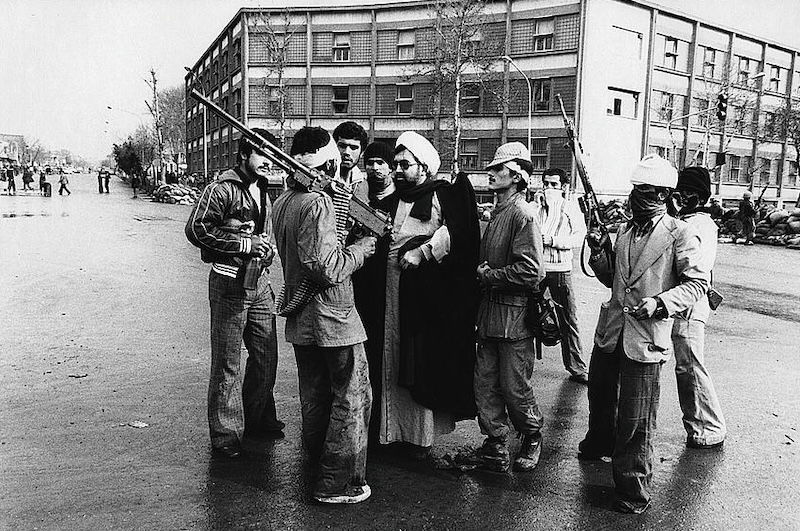 A mullah issues instructions to revolutionaries, Tehran, Hatami, 11 February 1979. Library of Congress. Public Domain.