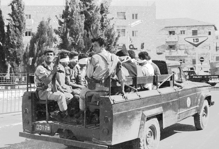 Jordanian prisoners of war in East Jerusalem on Day Six of the Six Day War, by Dan Hadani, 1967. National Library of Israel (CC BY).
