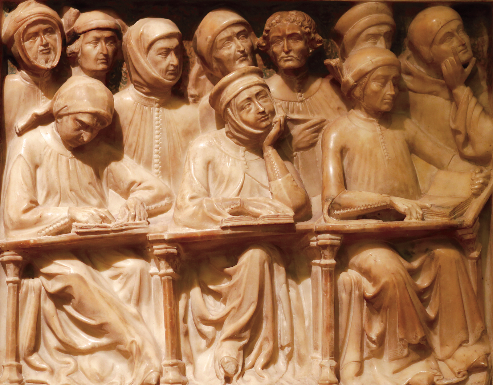 Carving of medieval university students on the tomb of the scholar Giovanni da Legnano, Bologna, 14th century.